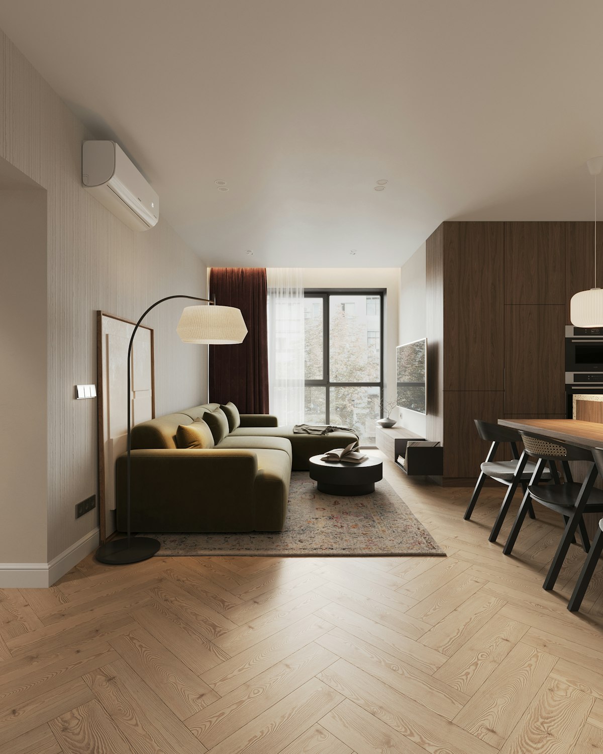 Sala de estar integrada de apartamento moderno, com sofá verde e piso de madeira